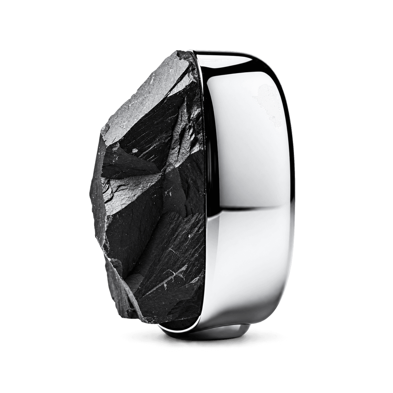 A rough black stone surface meeting a mirror-polished sculptural form